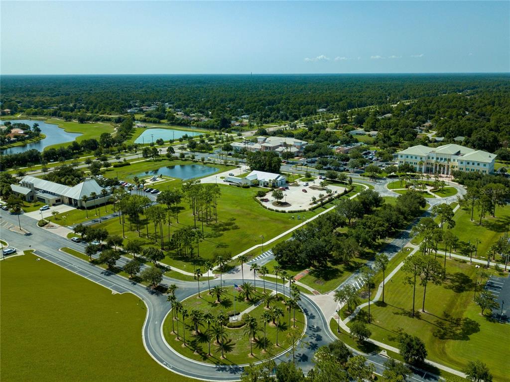An aerial view shows a suburban office park with buildings, parking lots, and a roundabout — 4340 LAGRANGE AVENUE, NORTH PORT, FL