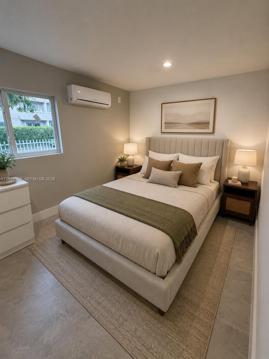 A white exterior wall features a door labeled A and a mounted lockbox — 521 NW 33rd Ave # 1, Miami FL 33125, MIAMI, FL