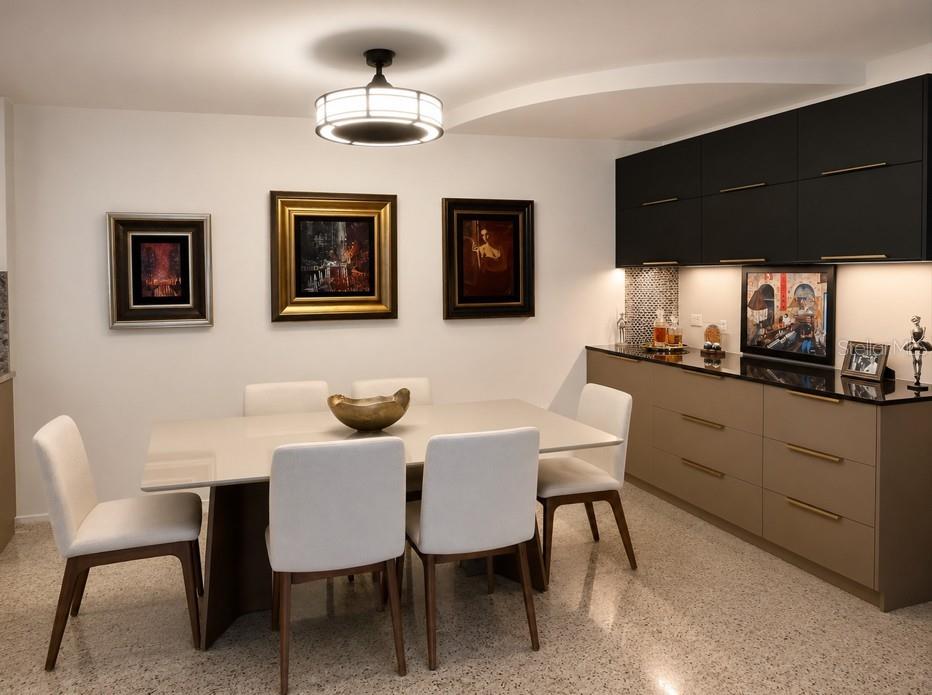 A dining room features a light-colored table, white chairs, black cabinetry, and three framed paintings — 185–187 PINE GROVE STREET, CAROLINA, PR