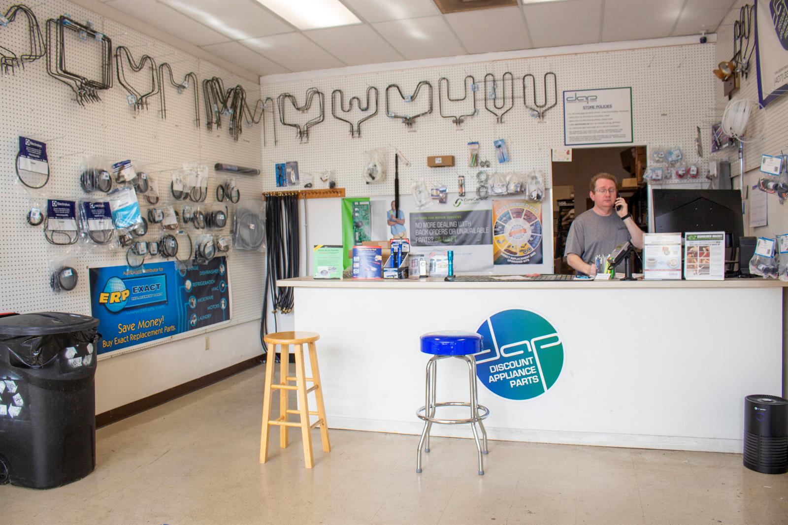 An appliance parts store interior features a service counter, wall-mounted heating elements, and a clerk — 851 W State Rt 436 # 1007, FL 32714, FL