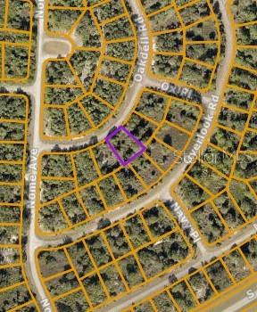 An aerial map view shows a highlighted vacant lot within a residential neighborhood — LOT 4 OAKDELL ROAD, NORTH PORT, FL