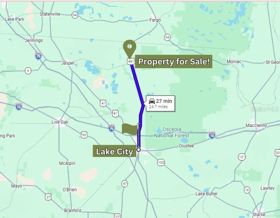 This map shows a driving route between Lake City and a property for sale — US HWY 441 N, LAKE CITY, FL