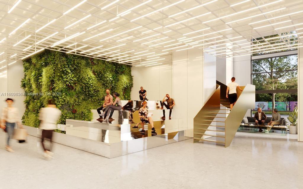 This rendering shows a modern lobby with a living wall, tiered seating, and a gold staircase — 1642 NE 1st Ave # 2308, Miami FL 33132, MIAMI, FL