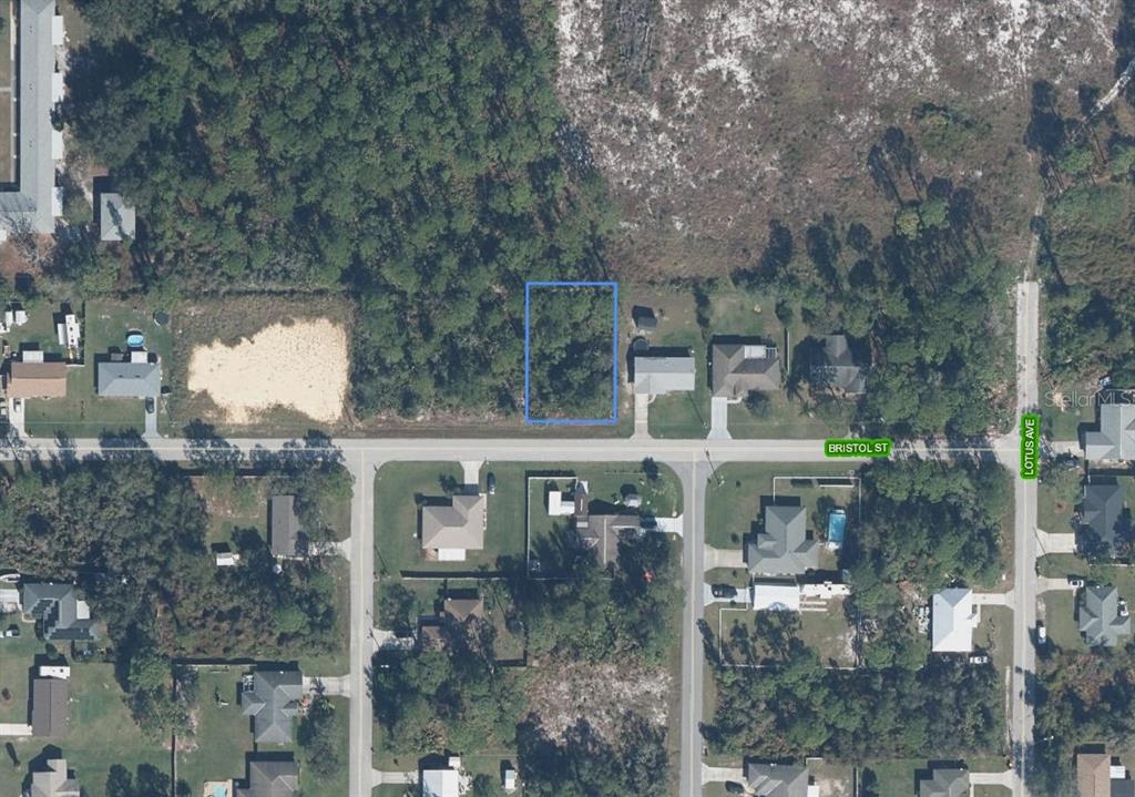This aerial map shows a vacant, rectangular lot outlined in blue along a residential street — 3108 BRISTOL STREET, SEBRING, FL