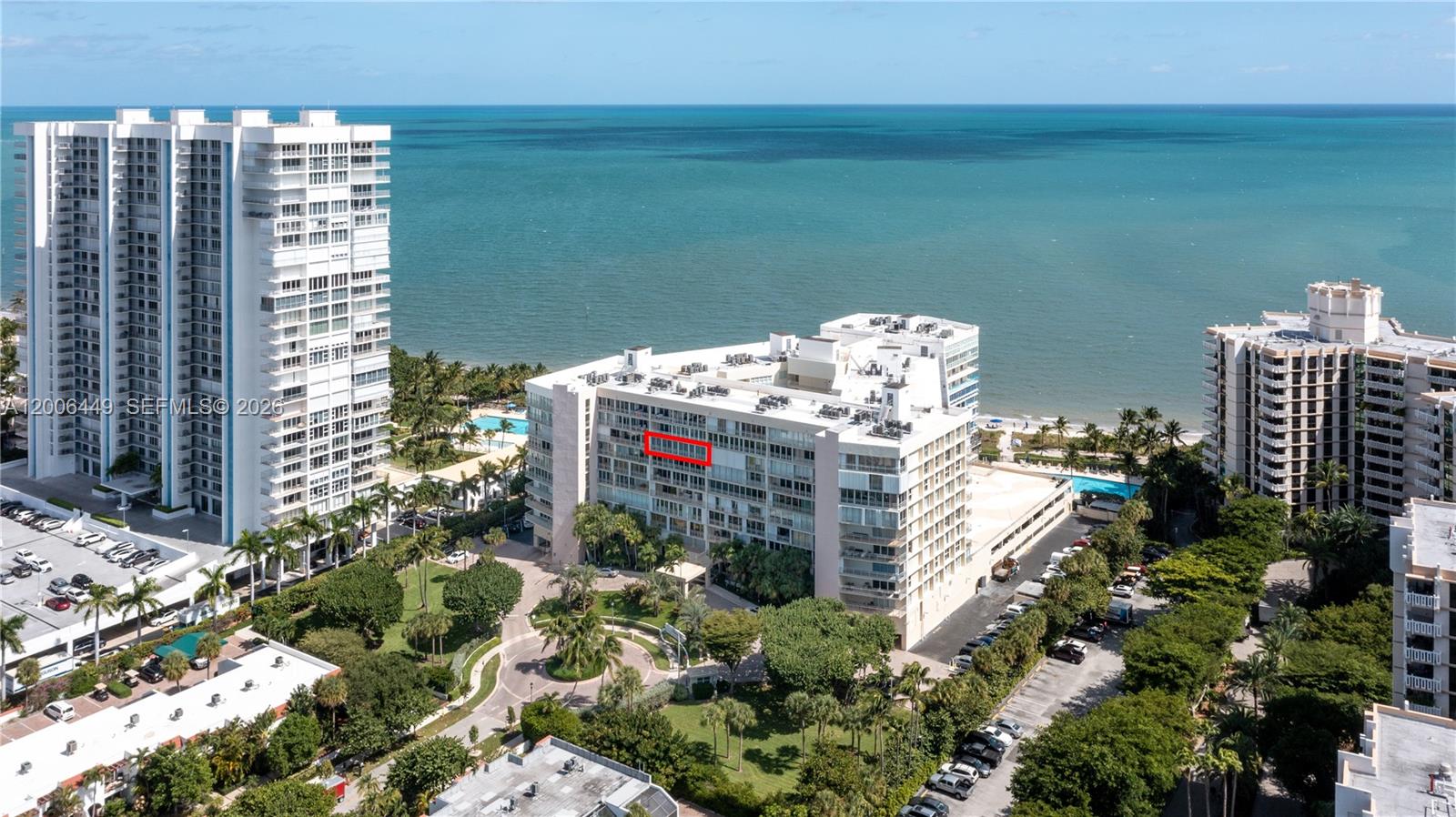 An aerial view shows a multi-story residential building with a red box highlighting a unit — 600 Grapetree Dr, Key Biscayne FL 33149, KEY BISCAYNE, FL