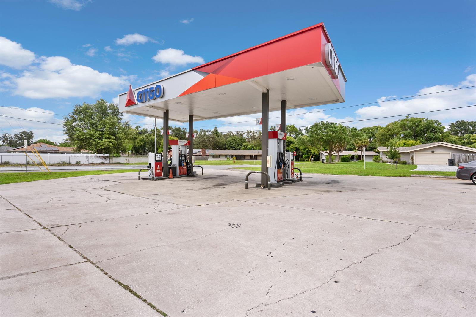 An outdoor view of a Citgo gas station with a large canopy and concrete lot — 31799 Us Hwy 27, FL 33844, FL