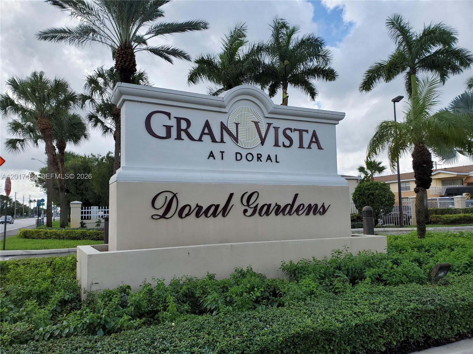 A large monument sign for Gran Vista at Doral stands amidst palm trees and landscaping — 4520 NW 79th Ave # 2D, Doral FL 33166, DORAL, FL