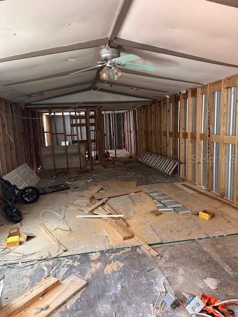 An interior view of a room under renovation with exposed wall studs and subflooring — 6631 CELESTE LANE, NEW PORT RICHEY, FL
