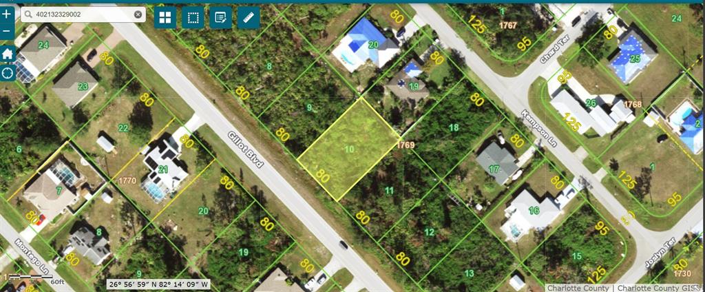 This is a satellite map view showing a vacant residential lot highlighted in yellow — 5552 GILLOT BOULEVARD, PORT CHARLOTTE, FL