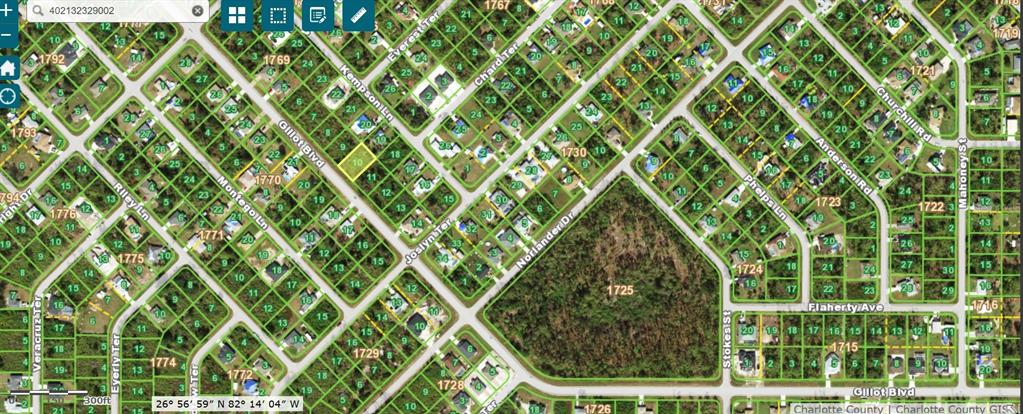 This is a satellite map view of a residential neighborhood with plotted property lines — 5552 GILLOT BOULEVARD, PORT CHARLOTTE, FL