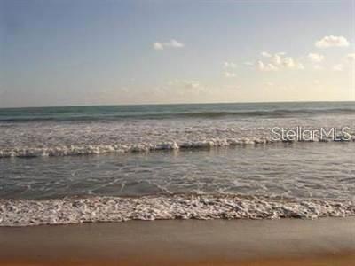 A view of ocean waves rolling onto a sandy beach under a clear sky — 9000 RIO MAR  BOULEVARD UNIT 443, RIO GRANDE, PR