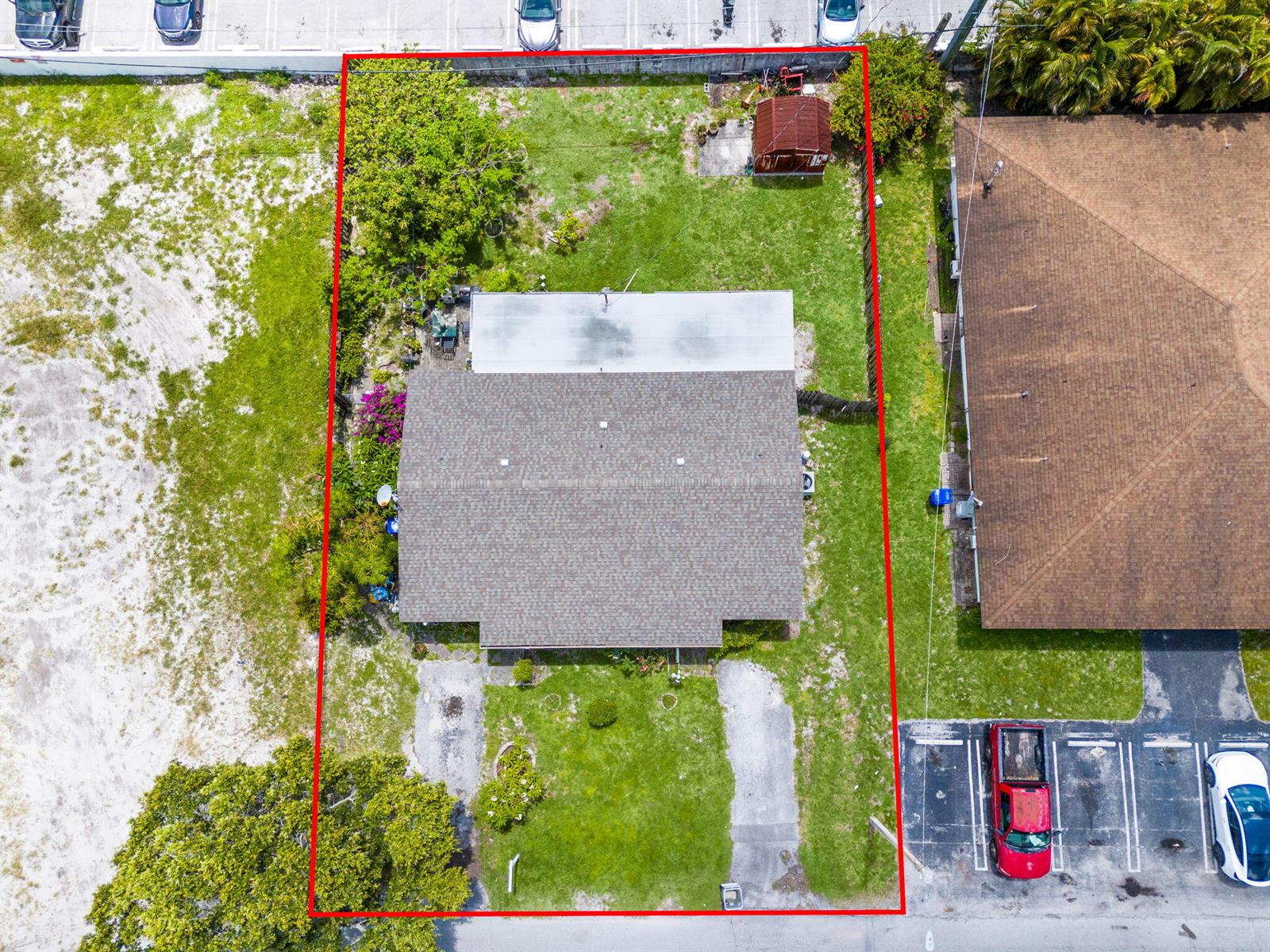 An aerial view shows a house with a shingled roof and a fenced backyard — 3560 NW 3rd Avenue # 2, Pompano Beach FL 33064, POMPANO BEACH, FL