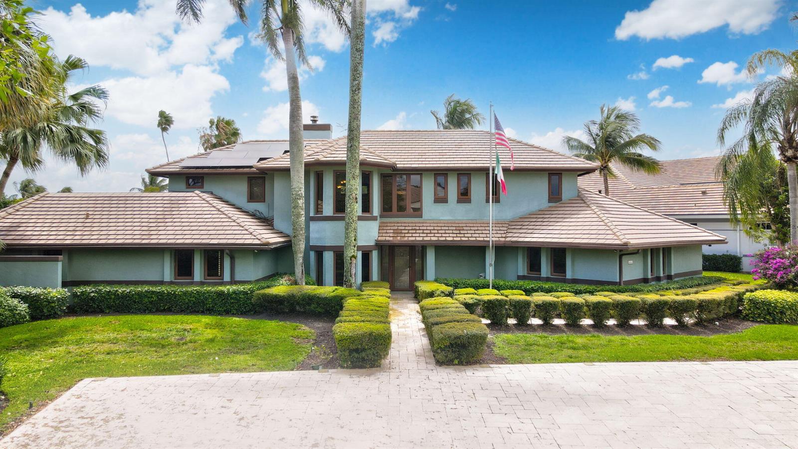 A two-story house with a tiled roof, green stucco exterior, and a paved front walkway — 4348 Saint Andrews Drive, Boynton Beach FL 33436, BOYNTON BEACH, FL