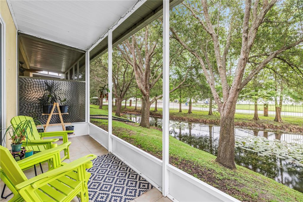 A two-story house with a paved driveway and a basketball hoop in the yard — 2982 ESTANCIA PLACE, CLEARWATER, FL