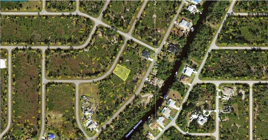 This aerial map shows a vacant residential lot highlighted in yellow within a suburban neighborhood — 250 SALUDA TERRACE, PORT CHARLOTTE, FL