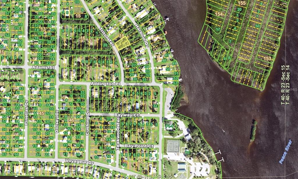 This is a satellite map showing residential lots, streets, and a river — 2416 TRITON TERRACE, PUNTA GORDA, FL
