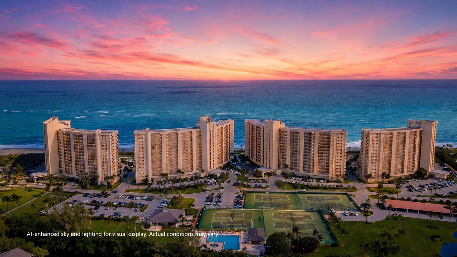 An aerial view of a large beachfront resort complex with tennis courts and a pool — 400 Ocean Trail Way # 205, Jupiter FL 33477, JUPITER, FL