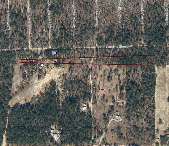 This is an aerial map showing a rectangular property parcel outlined in red — Lot 34 S CAROLINA STREET, HAWTHORNE, FL