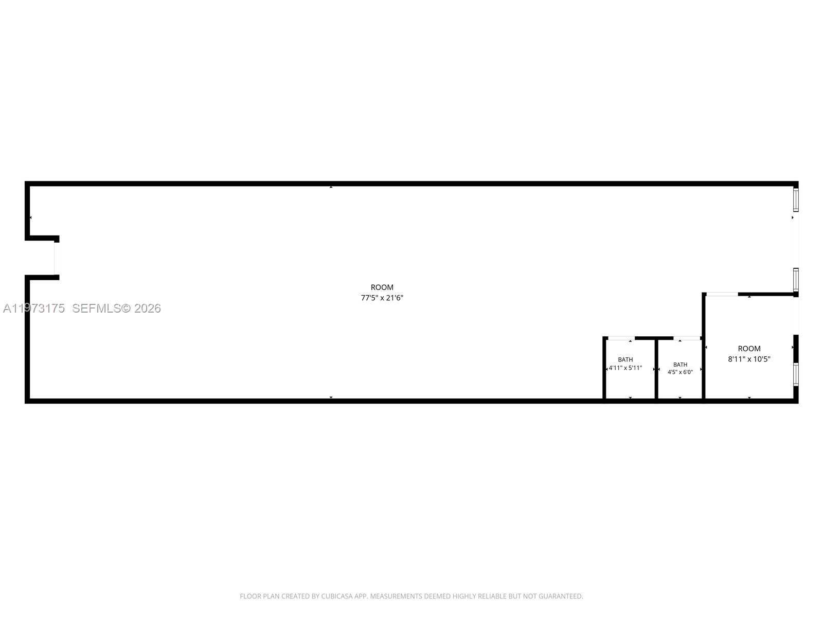 This is a floor plan showing a large open room, two small bathrooms, and a bedroom — 1852 NW 20th St # 1852, Miami FL 33142, MIAMI, FL