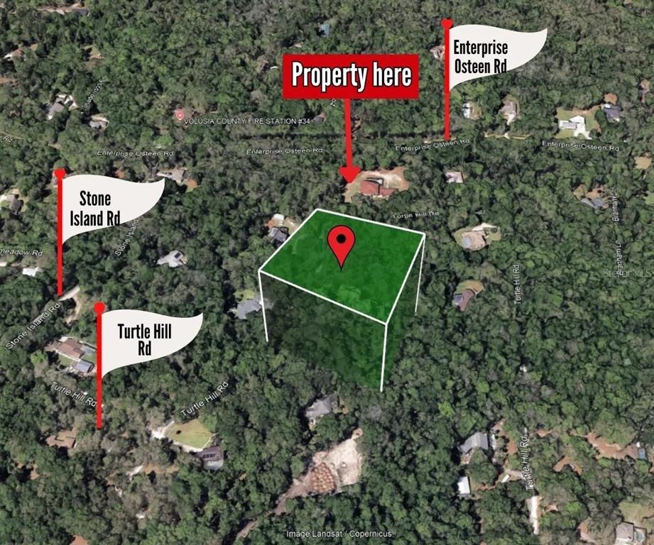 An aerial map view shows a highlighted property lot located near several wooded residential roads — 1877 TURTLE HILL ROAD, DELTONA, FL