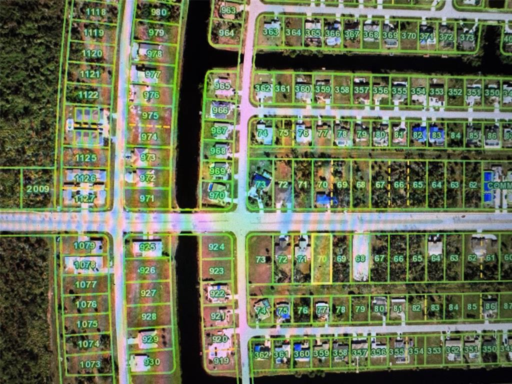 This is a satellite map view showing residential lots and streets in a neighborhood — 285 ROTONDA BOULEVARD W, ROTONDA WEST, FL