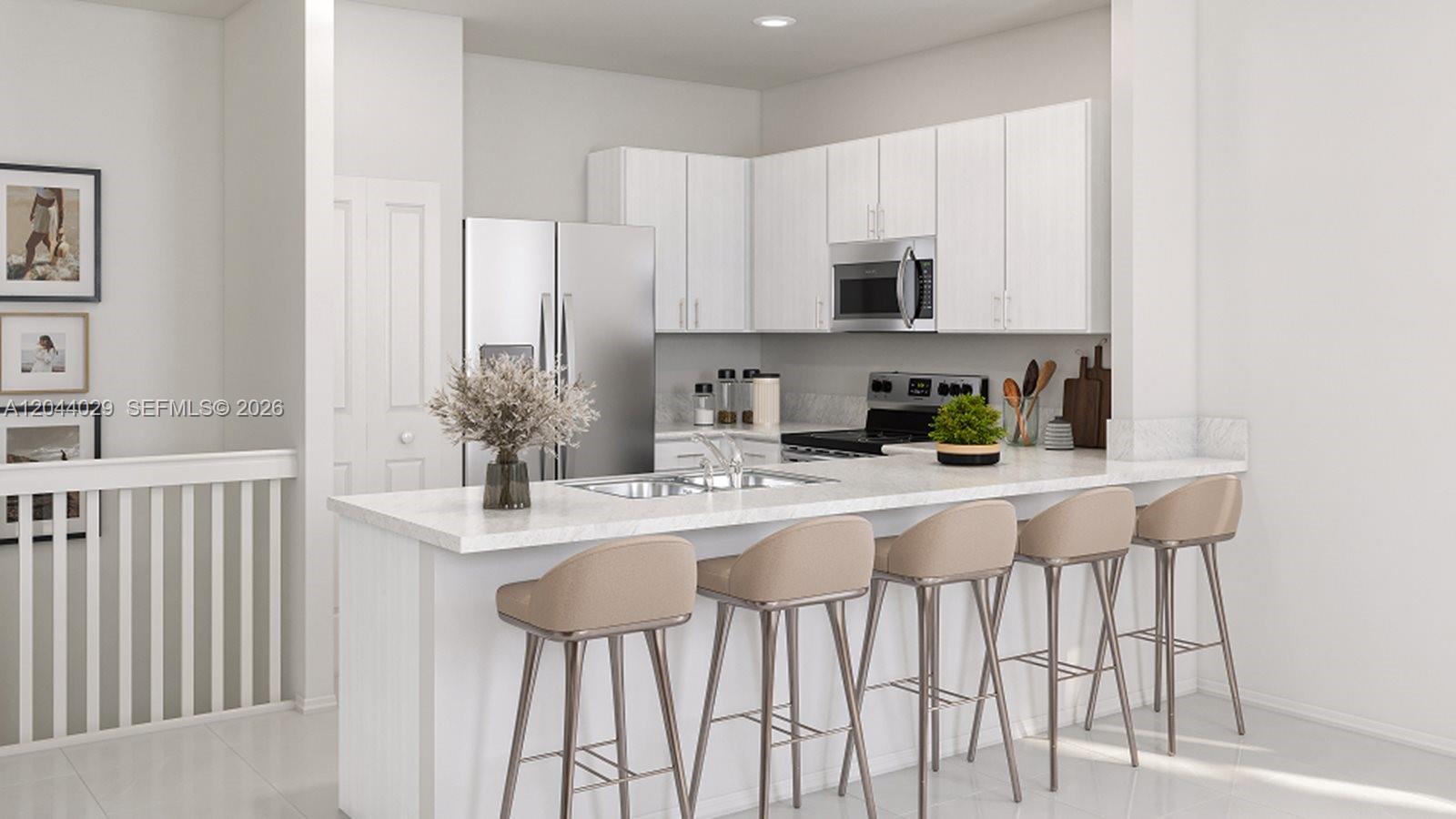 This rendering shows a modern kitchen with white cabinetry, stainless steel appliances, and a breakfast bar — 12420 SW 248 ST # 10, Miami FL 33032, MIAMI, FL