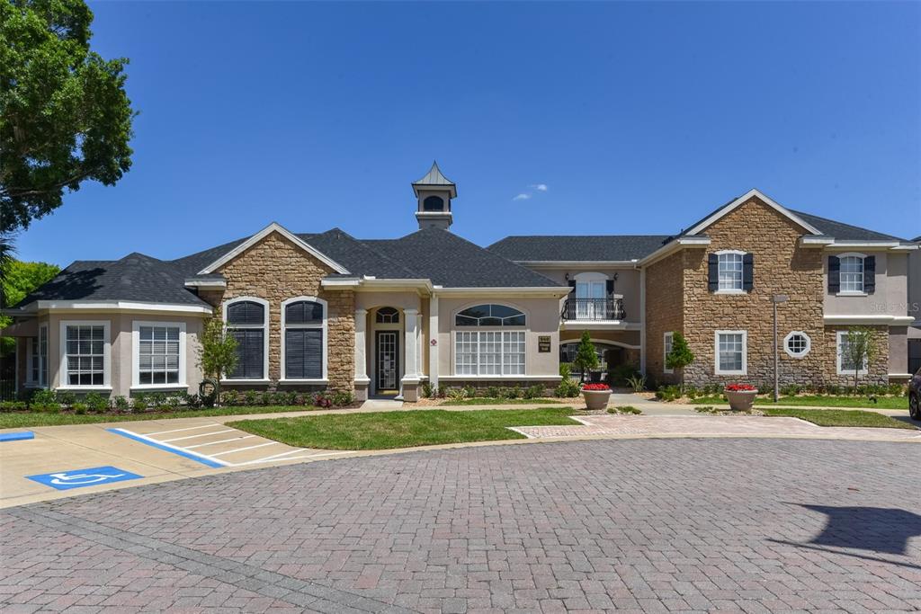 This is a floor plan for a two-bedroom, two-bathroom apartment with an enclosed patio — 940 VILLAGE TRAIL UNIT 6-103, PORT ORANGE, FL