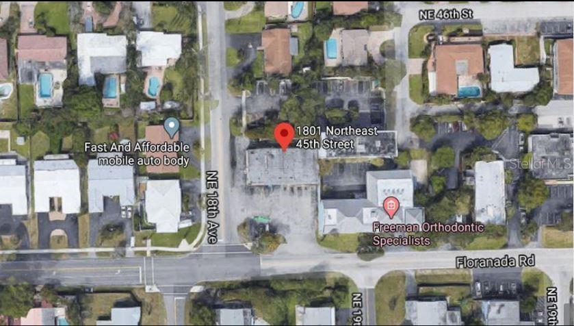 This is an aerial map view showing a commercial building located at a street intersection — 1801 NE 45TH STREET, FORT LAUDERDALE, FL