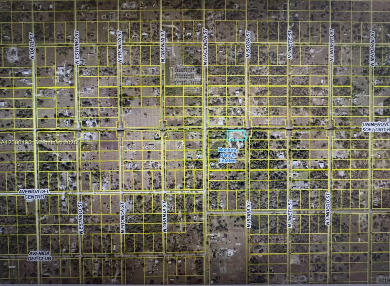 This is a satellite map showing a grid of residential lots in Montura Ranch Estates — 380 N Isora, Clewiston FL 33440, CLEWISTON, FL