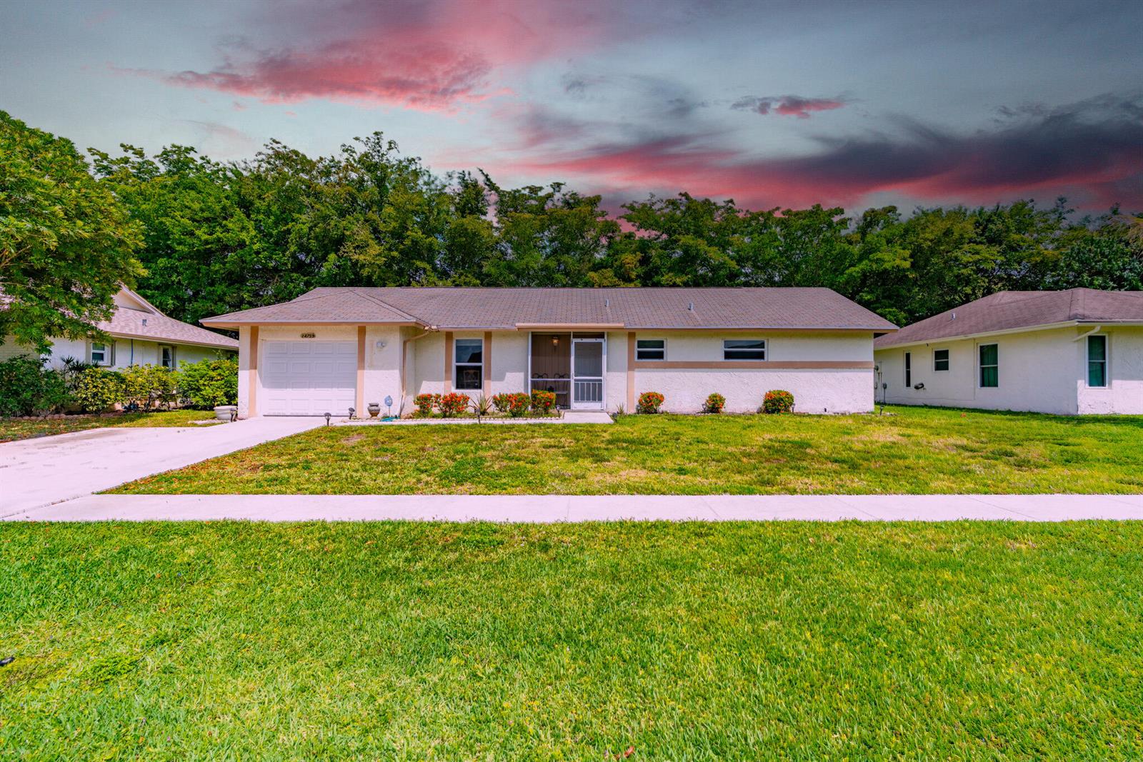 A single-story house with a white stucco exterior, a garage, and a front lawn — 14759 Hideaway Lane, Delray Beach FL 33484, DELRAY BEACH, FL