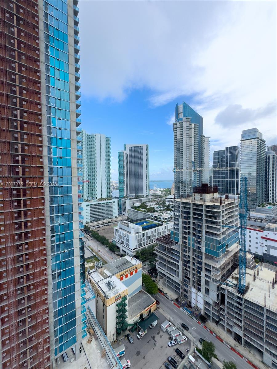 An elevated view of a dense urban skyline featuring several high-rise buildings under construction — 20 NE 11th St # 3006B, Miami FL 33132, MIAMI, FL