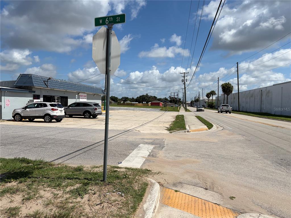 An aerial map shows a 3.53-acre commercial property with three buildings and an open field — 540 S SCENIC HIGHWAY, FROSTPROOF, FL