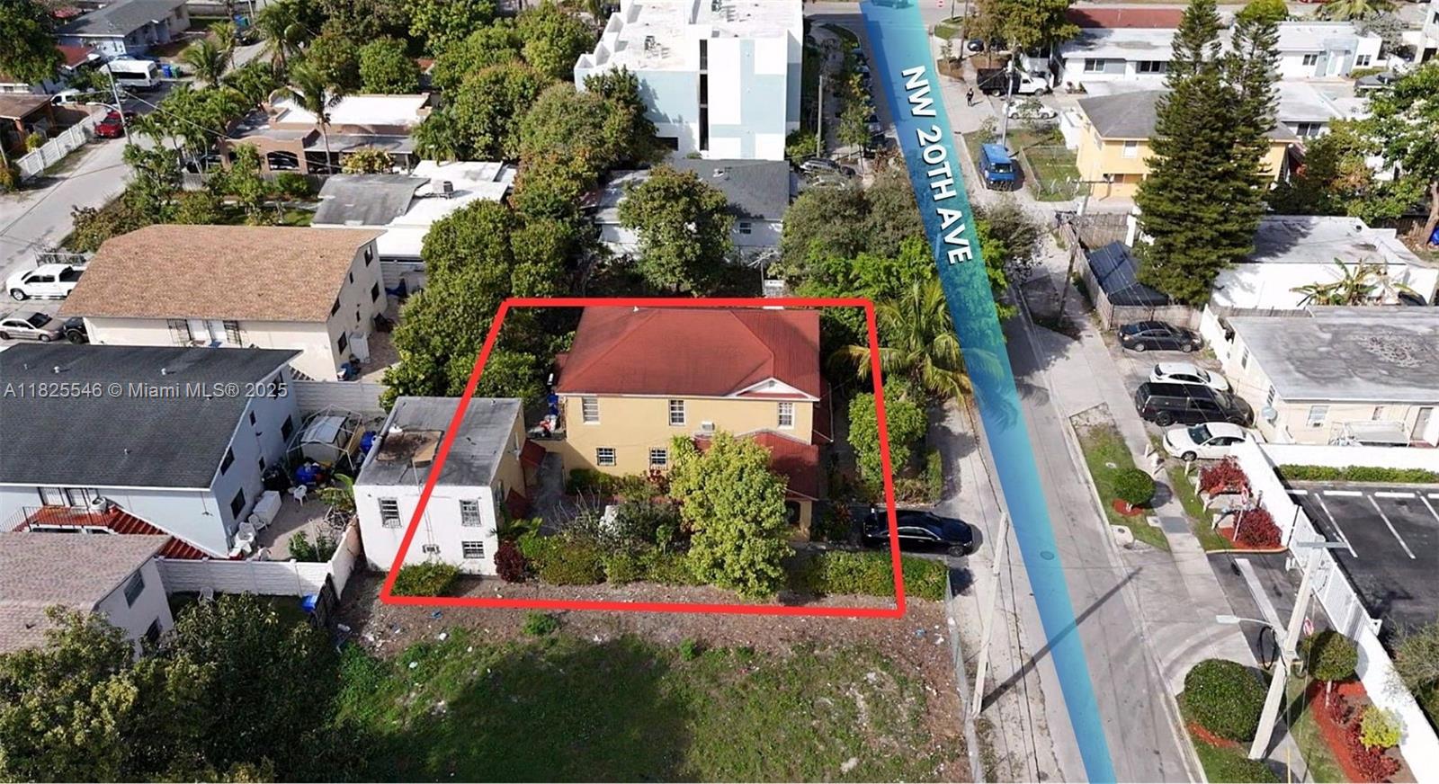 An aerial view shows a yellow two-story house with a red roof and adjacent structure — 3660 NW 20th Ave, Miami FL 33142, MIAMI, FL