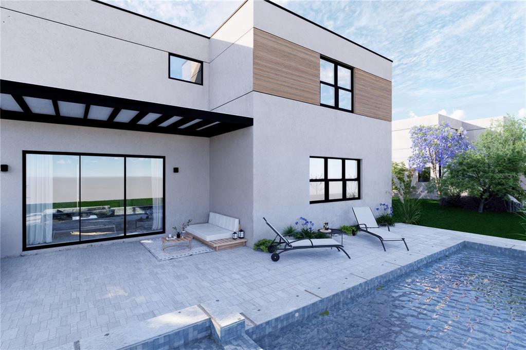 A rendering of a modern house exterior featuring a patio, swimming pool, and lounge chairs — 5750 CYRILS ROAD SF LOT 44, ST CLOUD, FL