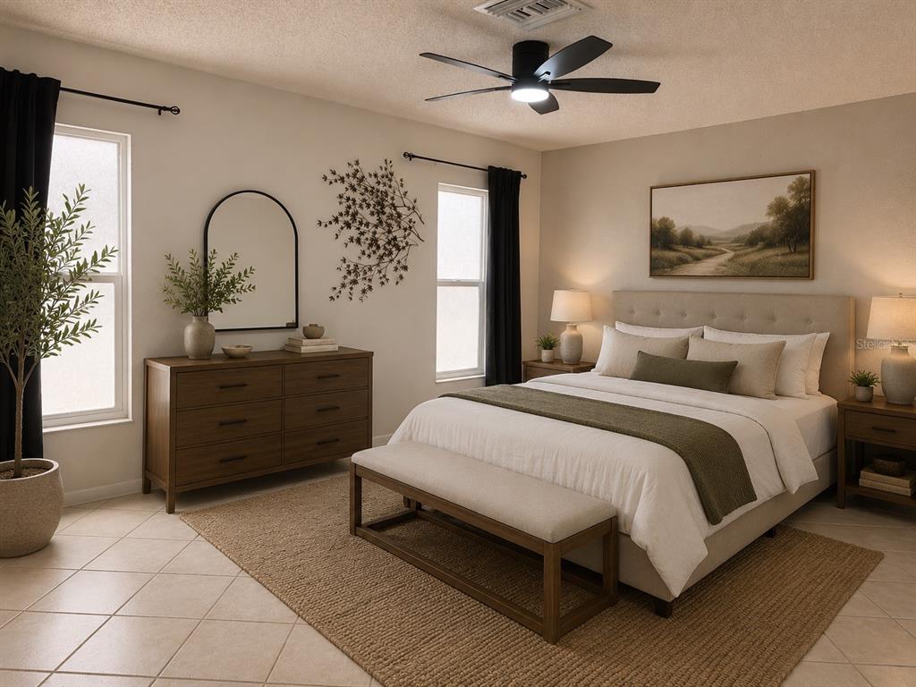 A bedroom features a bed with a beige headboard, a dresser, and a ceiling fan — 9554 86TH AVENUE, SEMINOLE, FL