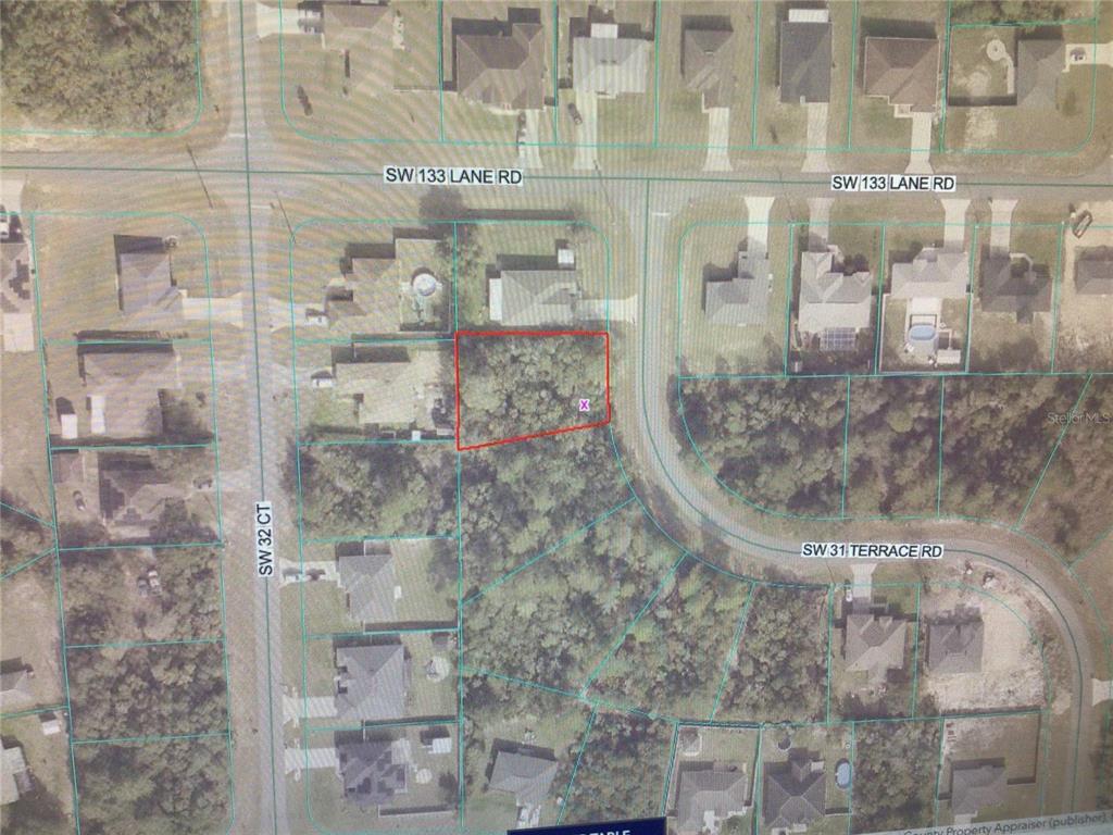 This is an aerial map view of a vacant residential lot outlined in red — 0 SW 31 TERRACE ROAD, OCALA, FL