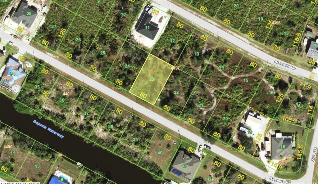 This is an aerial map showing a highlighted vacant residential lot among other subdivided parcels — 13879 BEGONIA CIRCLE, PORT CHARLOTTE, FL