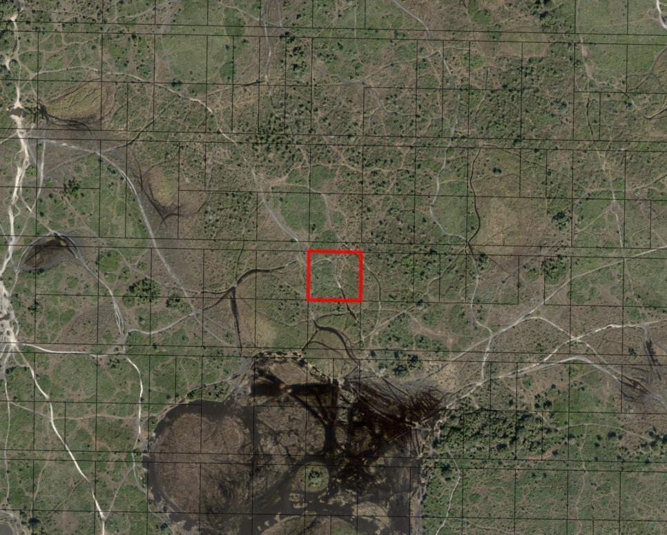 This is a satellite map view showing a red square highlighting a specific land parcel — 0 NW 310th Street, Okeechobee FL 34972, OKEECHOBEE, FL