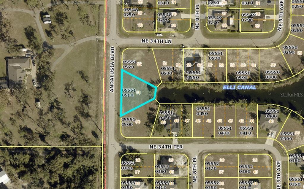 This is a map showing a highlighted vacant lot bordering a canal — 3421 ANDALUSIA BOULEVARD, CAPE CORAL, FL