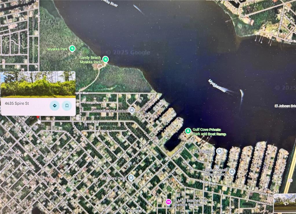 This is a satellite map view of a residential area near a river — 4635 SPIRE STREET, PORT CHARLOTTE, FL
