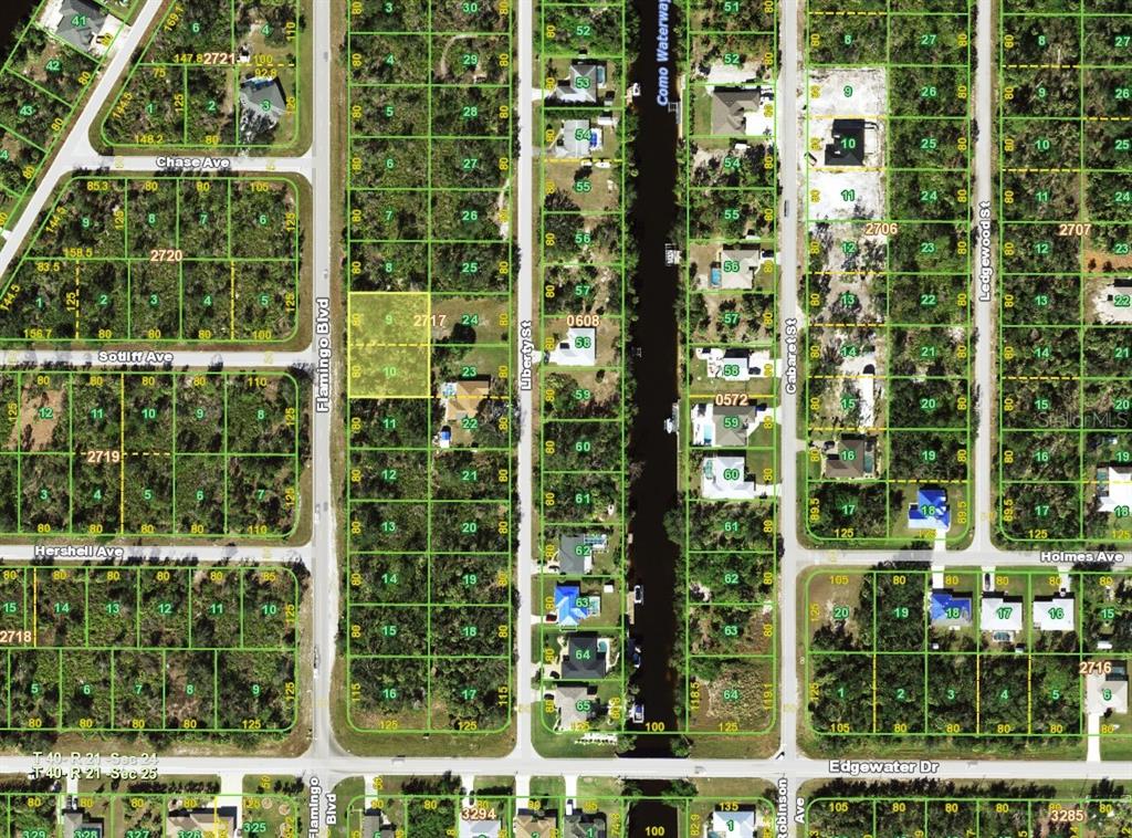 This is a satellite map showing residential lots, streets, and a canal — 3616 FLAMINGO BLVD, PORT CHARLOTTE, FL
