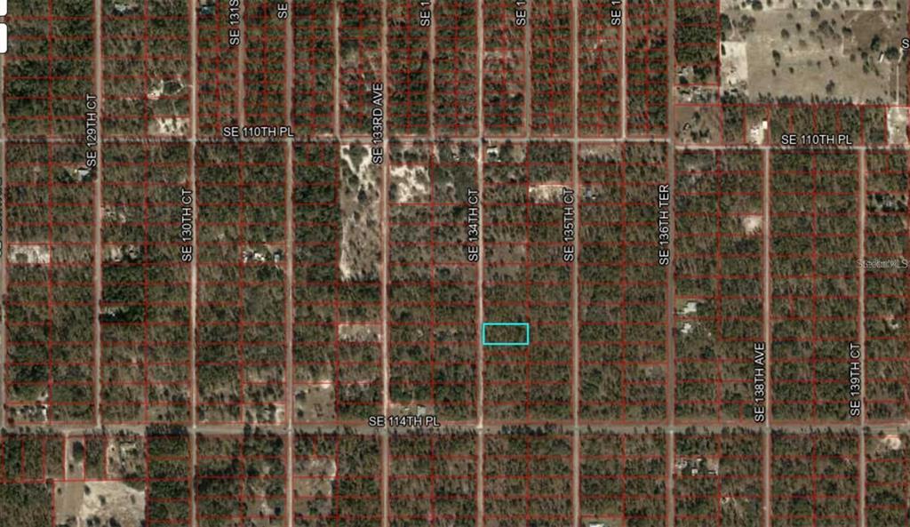 This is a map showing a rectangular parcel of land highlighted in blue — 00 SW 134TH COURT, DUNNELLON, FL