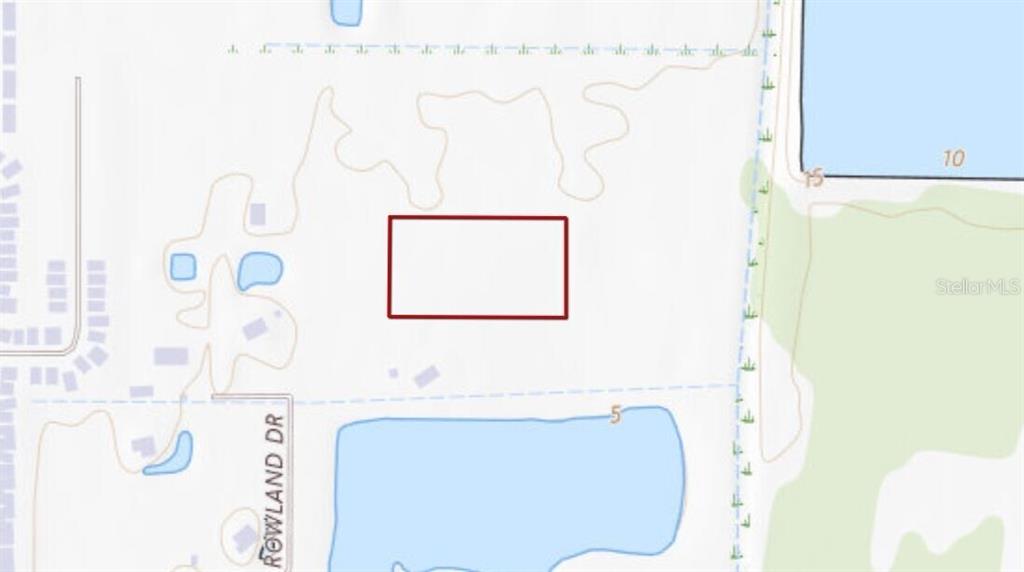 This is a map showing a rectangular property lot near a road and water features — 3321 ROWLAND DRIVE UNIT Tract E, PUNTA GORDA, FL