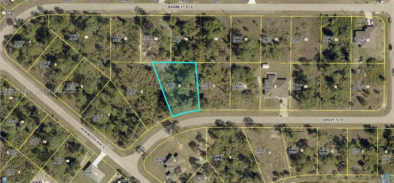 This is an aerial map showing a highlighted vacant lot among other residential parcels — 1047 Grove St E, Lehigh Acres FL 33974, LEHIGH ACRES, FL