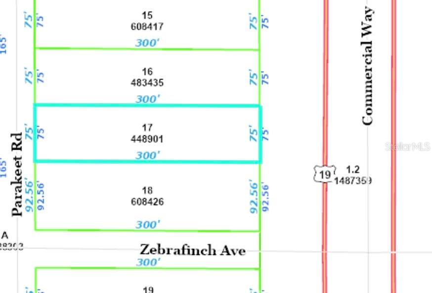 This is a land survey map showing parcel 17 and surrounding lots near Parakeet Road — COMMERCIAL WAY, WEEKI WACHEE, FL