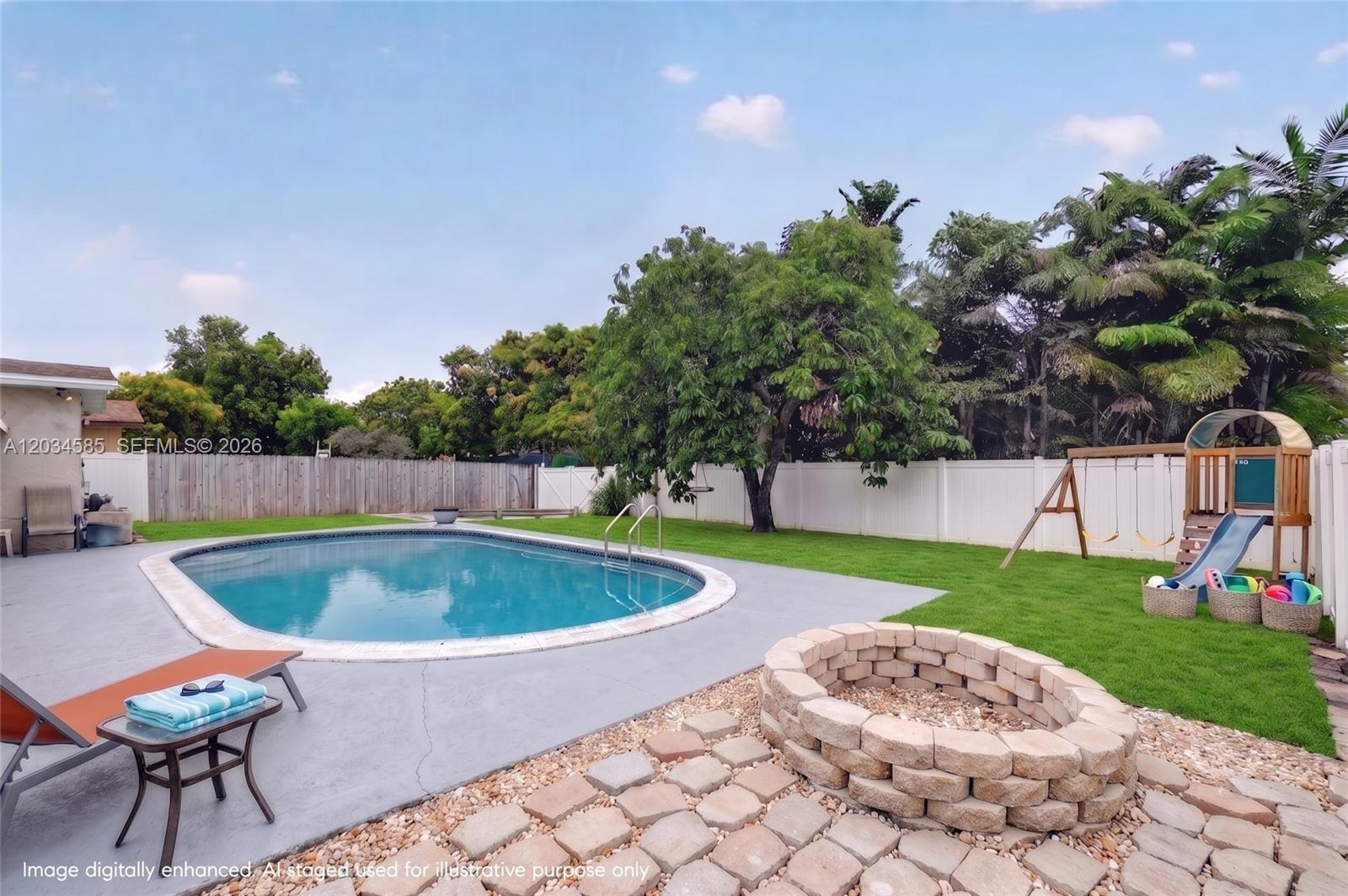 A backyard features a swimming pool, a stone fire pit, and a wooden playset — 1901 N 56th Ave, Hollywood FL 33021, HOLLYWOOD, FL