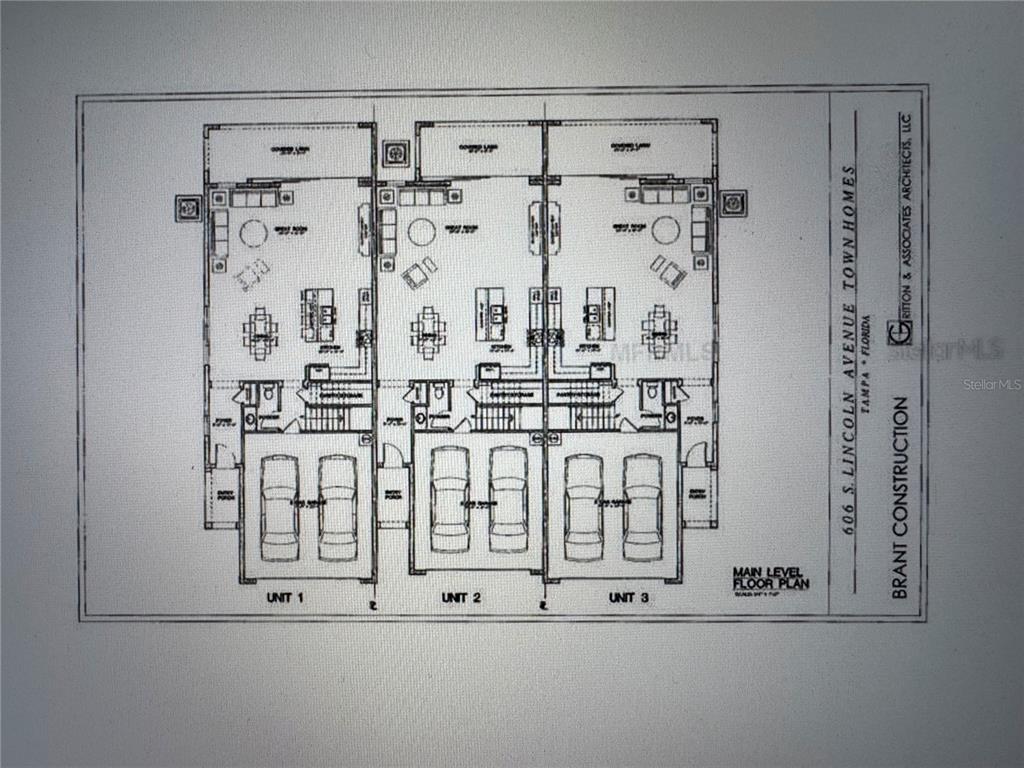 This is a main level floor plan for three attached townhome units with garages — 606 S LINCOLN AVENUE UNIT 3, TAMPA, FL