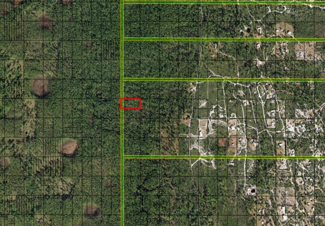 This is an aerial map showing a rectangular property parcel highlighted in red within a forest — 0 Hwy 630e, Frostproof FL 33843, FROSTPROOF, FL