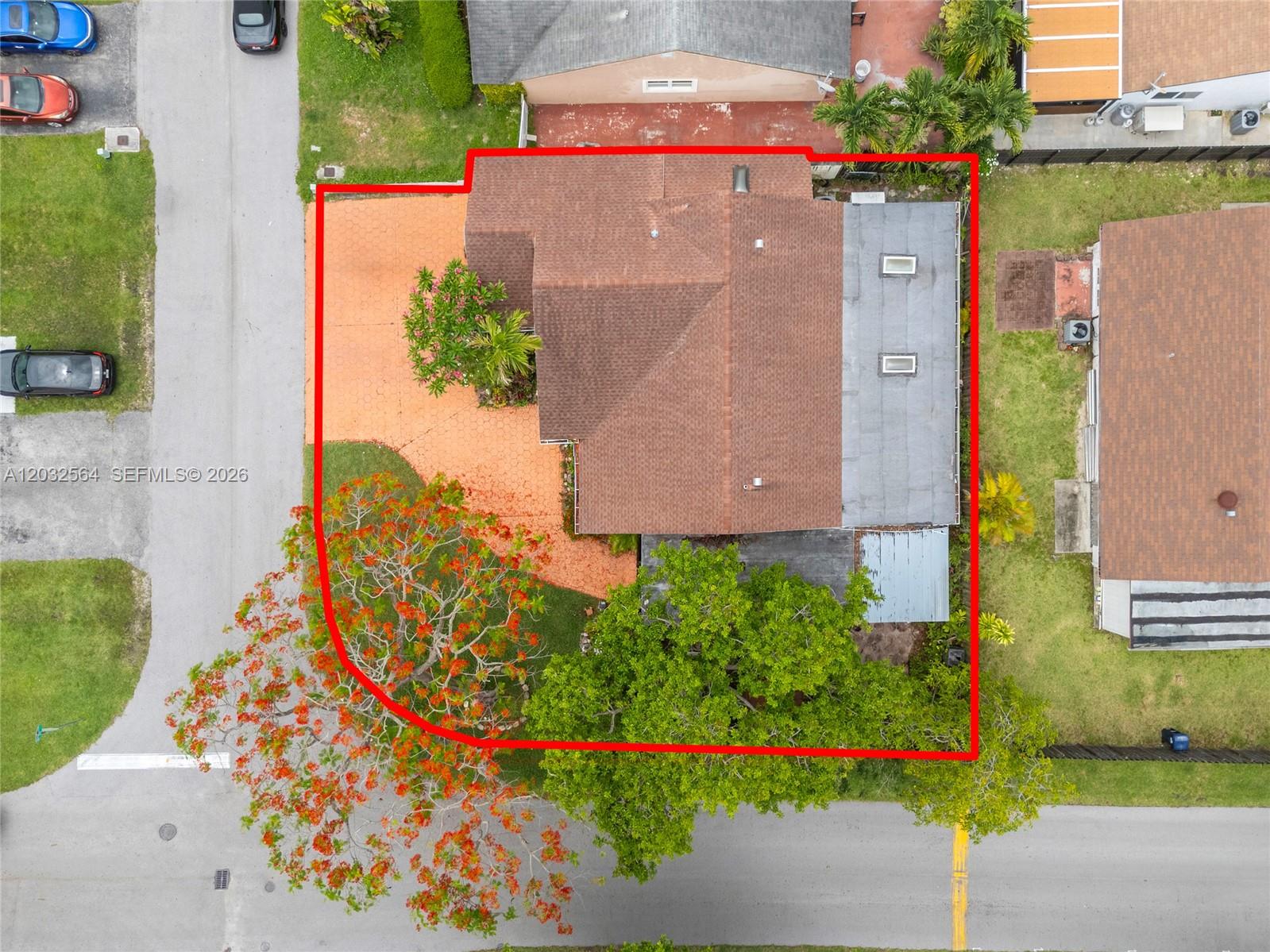 An aerial view shows a house with a red-tiled roof and a large flowering tree — 13332 SW 113th Ct, Miami FL 33176, MIAMI, FL