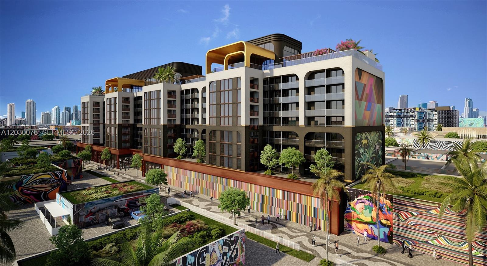 This is a rendering of a modern multi-story apartment building with colorful exterior murals — 2700 NW 2nd ave # 421, Miami FL 33127, MIAMI, FL